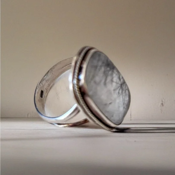 This piece is a black rutilated quartz ring set in sterling silver. Size 8 - Picture 1 of 6